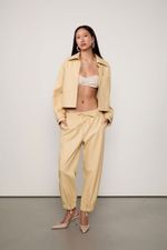 25342098_3618_1-CALCA-LIKE-LEATHER-JOGGING-ZIPER-BARRA